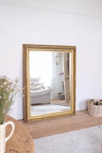 Antique bevelled mirror with wooden detailed frame