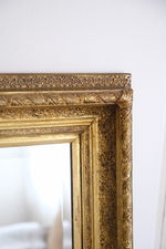 Load image into Gallery viewer, Antique bevelled mirror with wooden detailed frame
