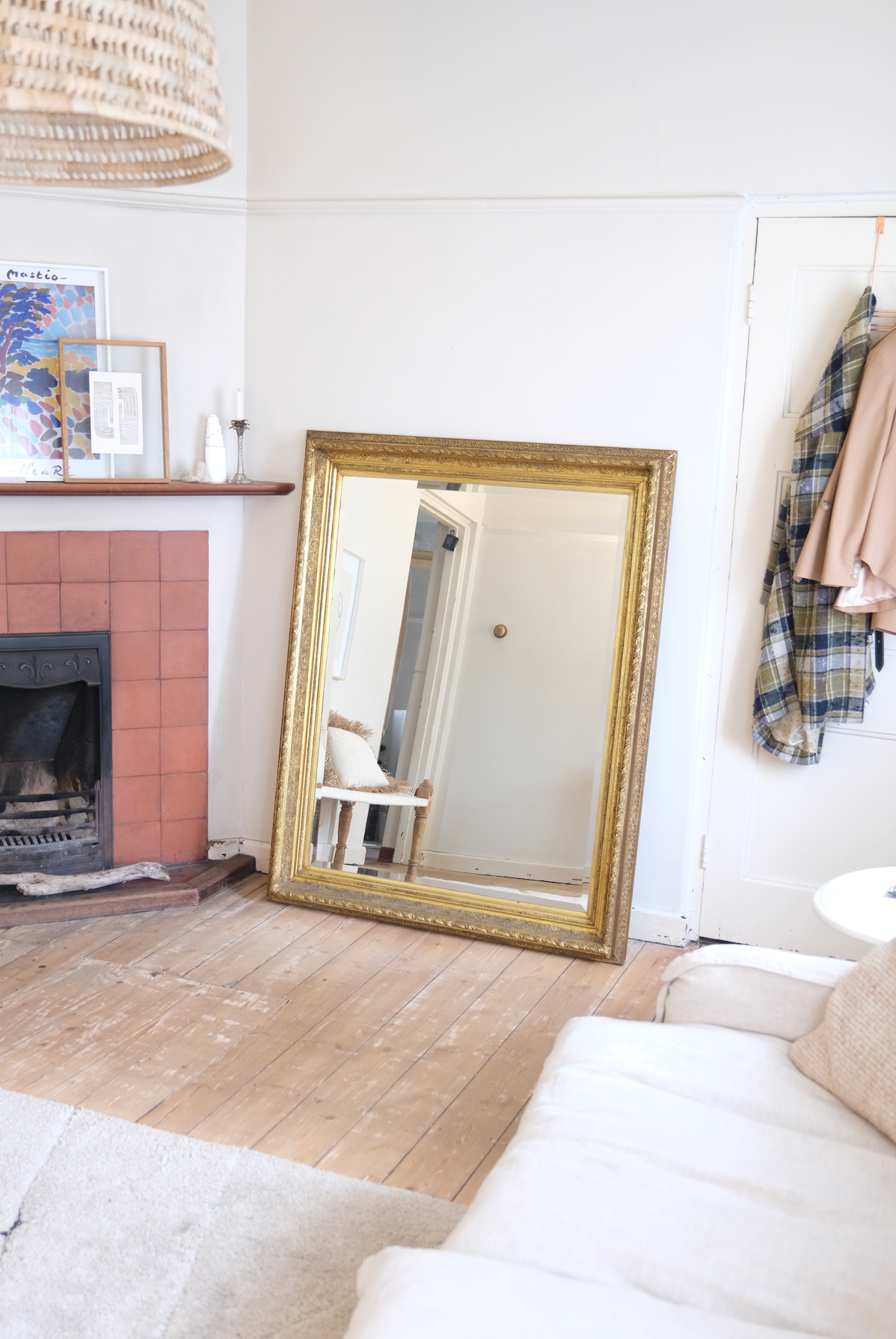 Antique bevelled mirror with wooden detailed frame