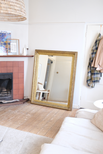 Antique bevelled mirror with wooden detailed frame