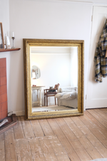 Load image into Gallery viewer, Antique bevelled mirror with wooden detailed frame
