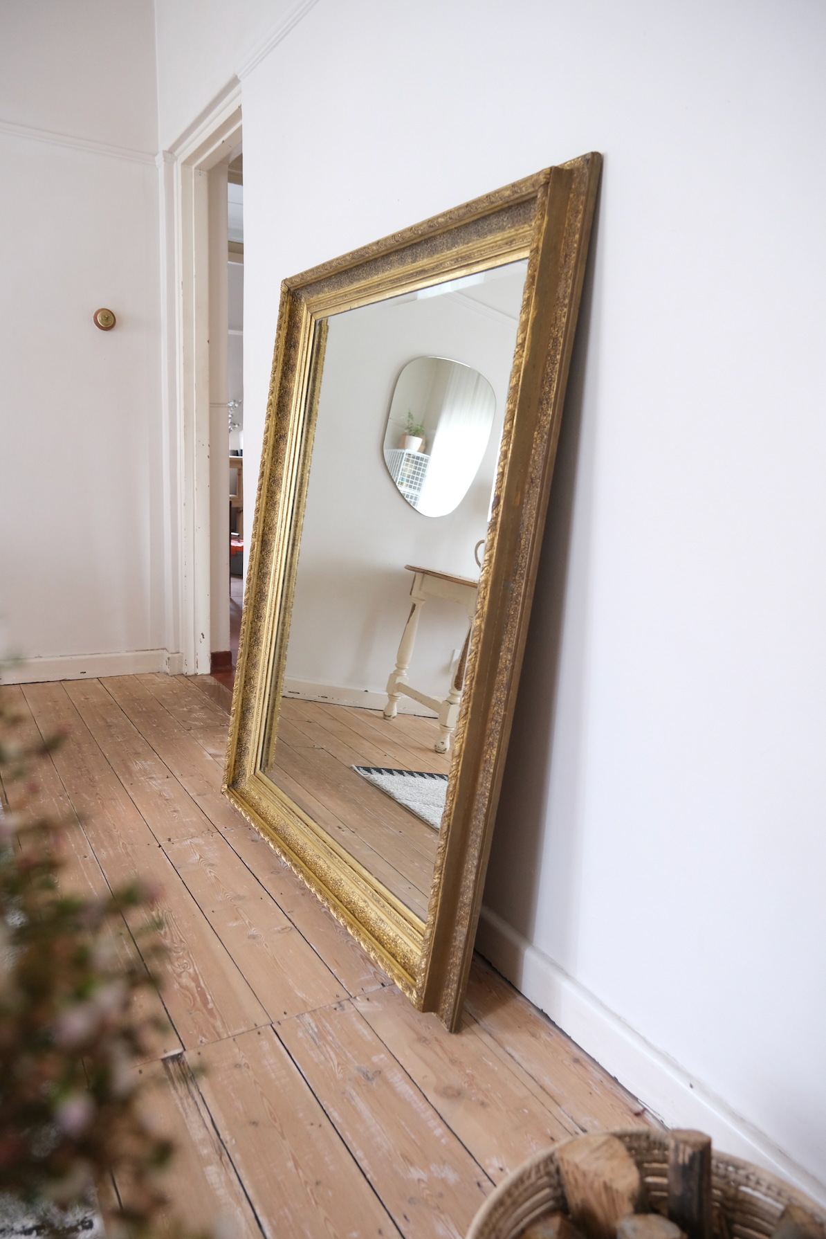 Antique bevelled mirror with wooden detailed frame