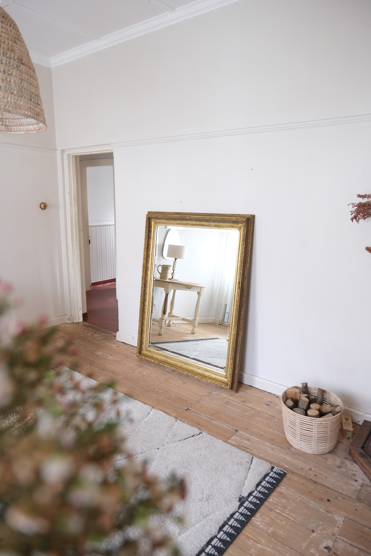 Antique bevelled mirror with wooden detailed frame