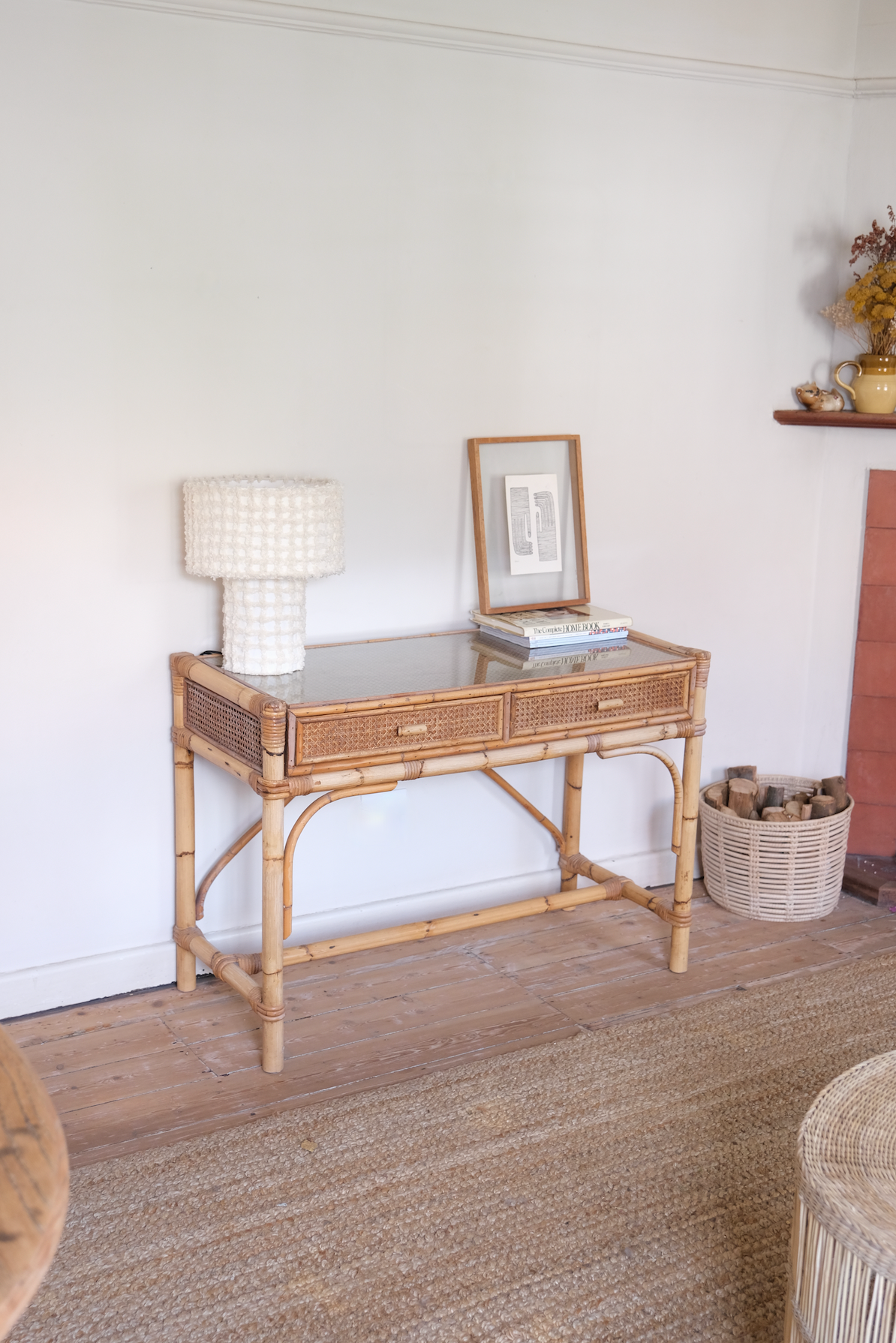 Cane desk with glass top