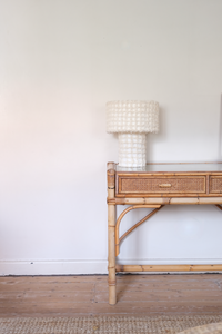 Cane desk with glass top