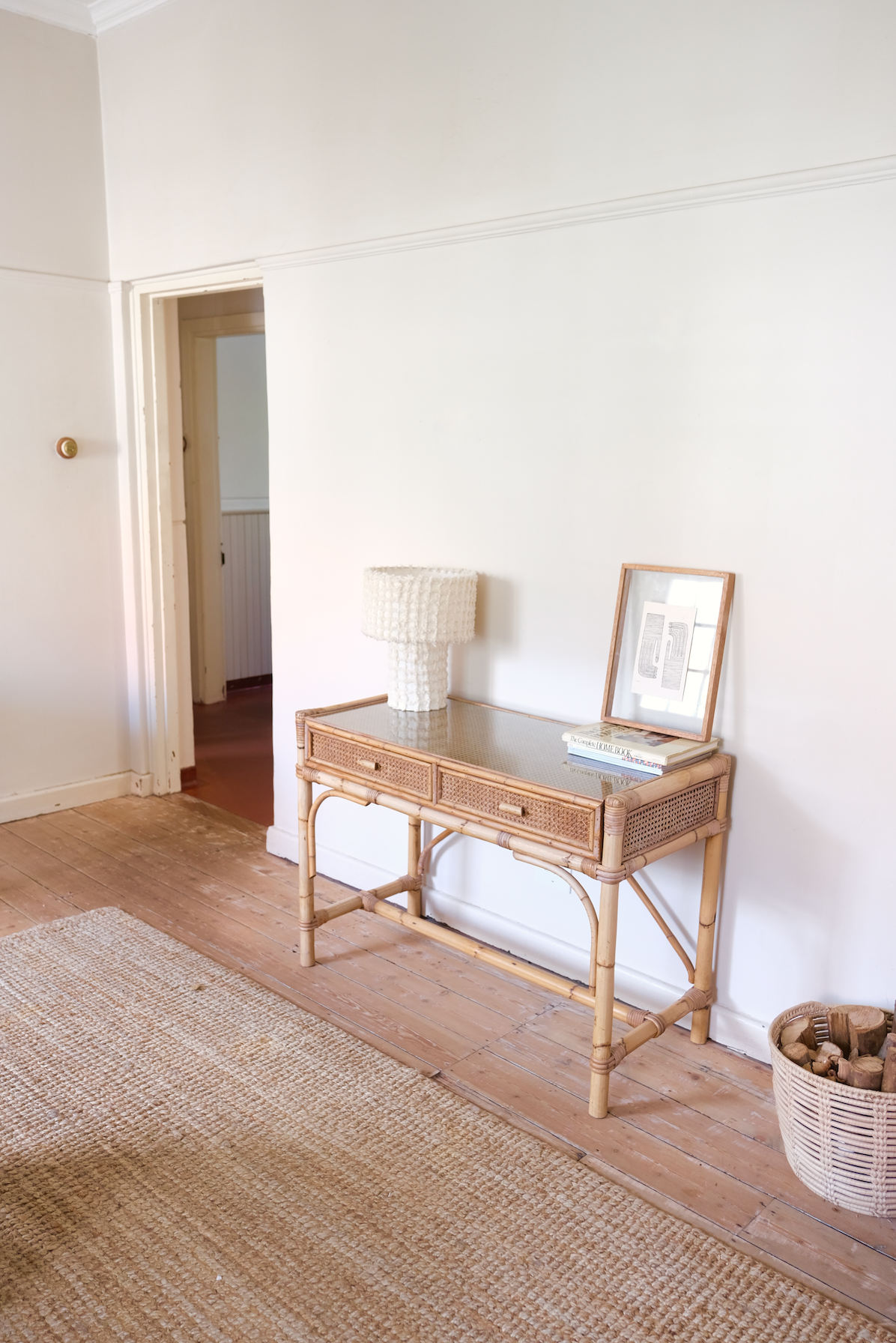 Cane desk with glass top