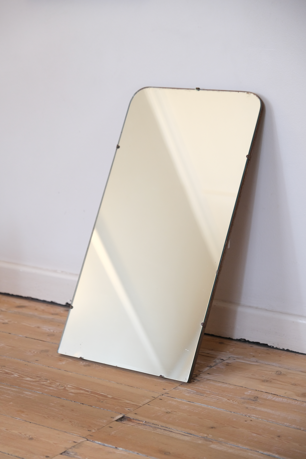 Vintage mirror with solide wooden back