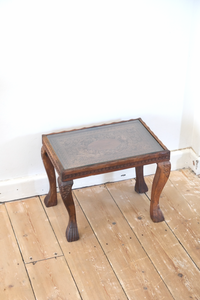 Wood carved stool with glass top