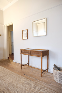 Cane console table