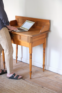 Wooden desk with carved legs