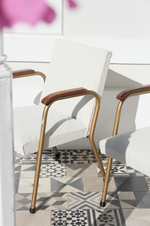 Load image into Gallery viewer, A pair of occasional chairs reupholstered with an off-white fabric
