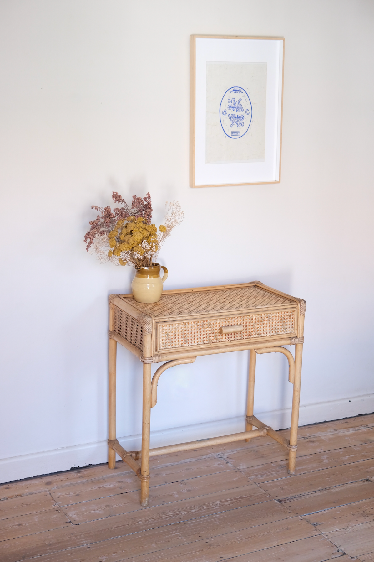 Cane console with drawer