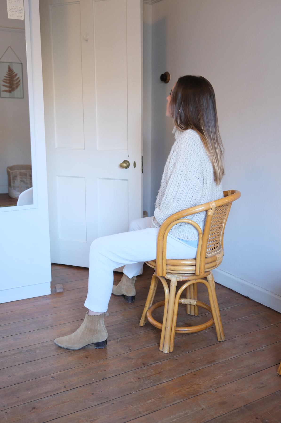 Pair of swivel cane chairs