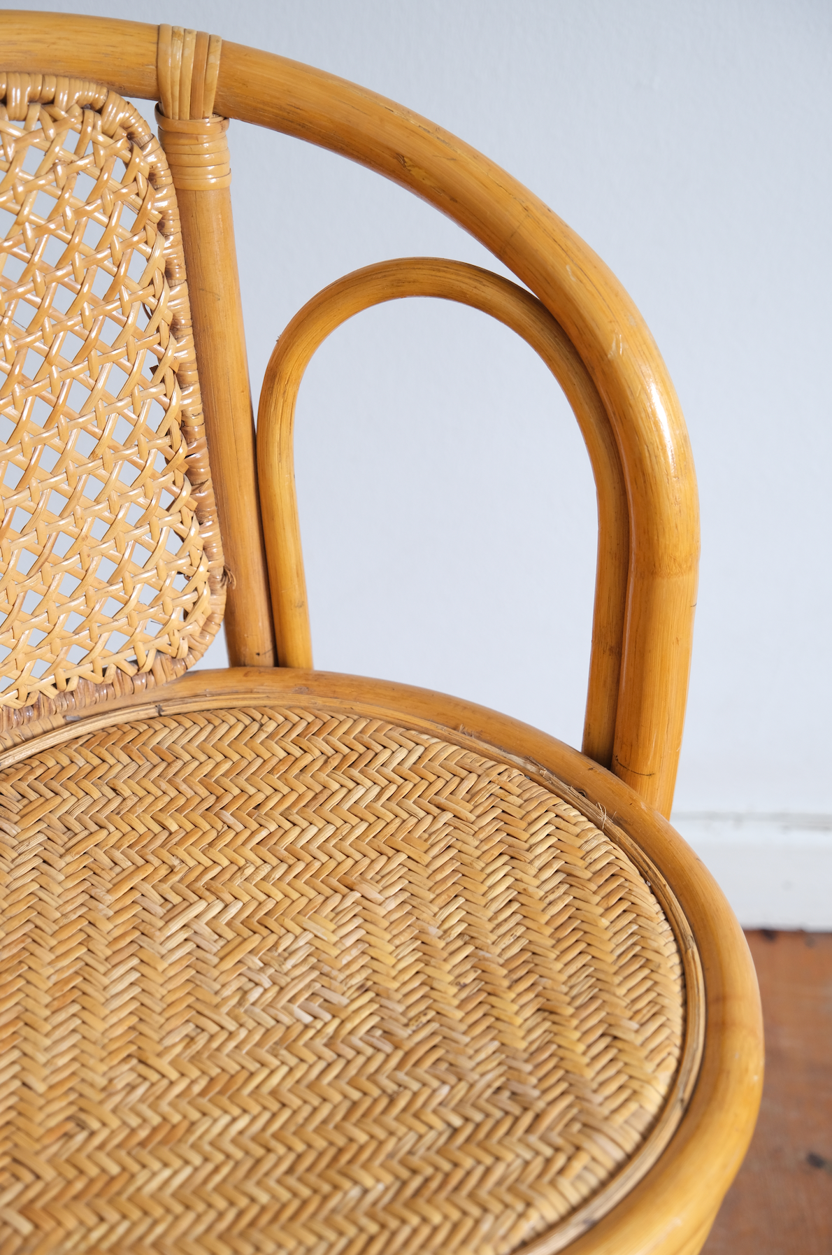 Pair of swivel cane chairs