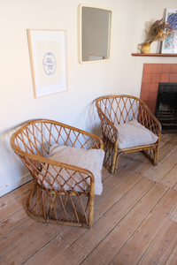 A pair of 1960's cane chairs